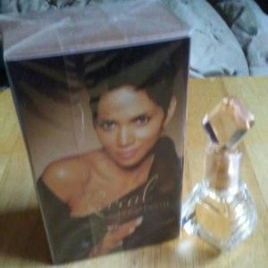 Reveal by Halle Berry
